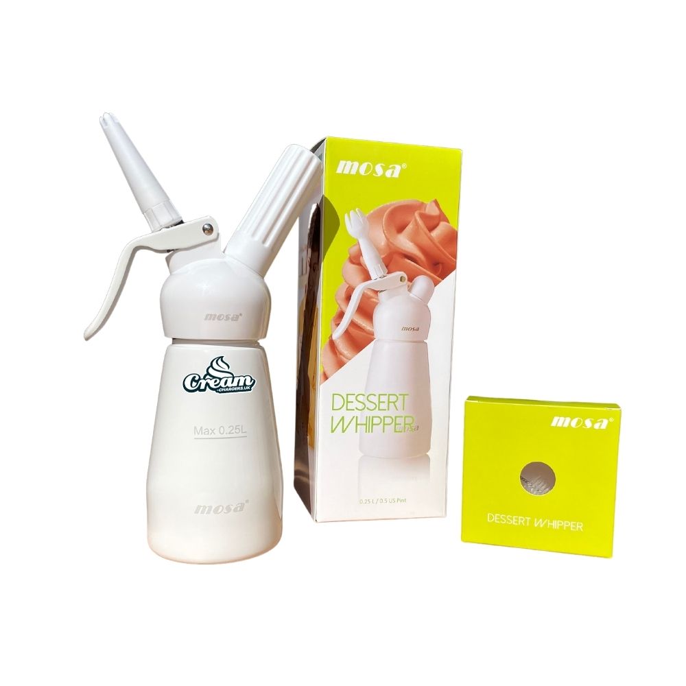 Mosa dessert whip mini dispenser in white next to the product packaging box. Florecent green product packing